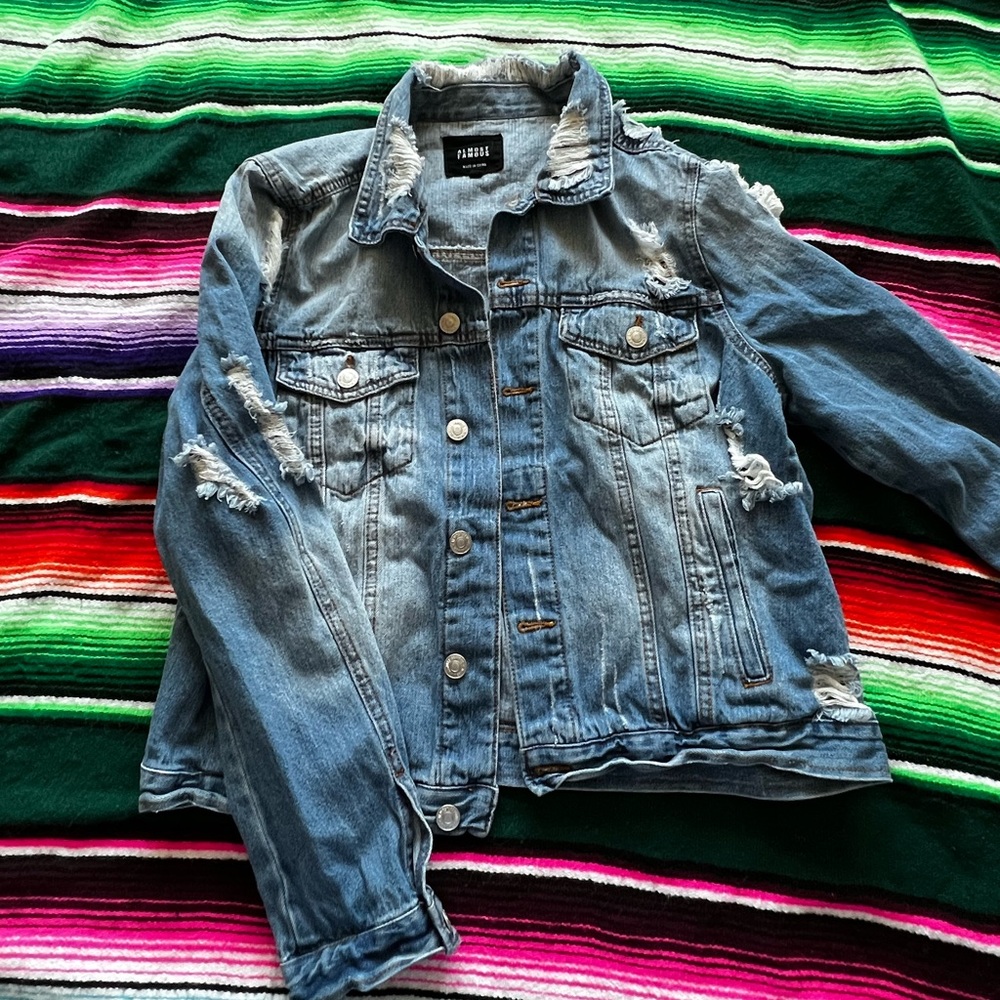 Distressed jean jacket